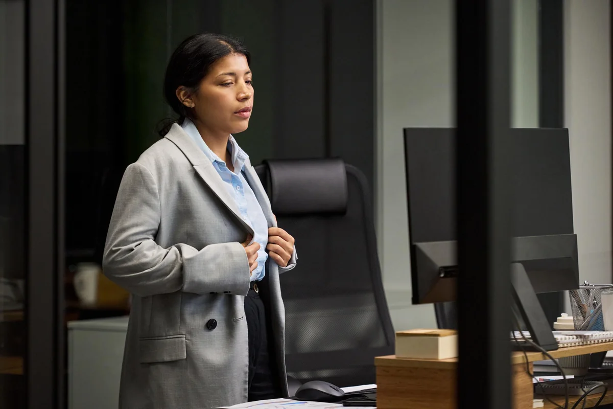 A person standing calm and self-assured, no longer waiting on others' approval, illustrating how to stop seeking external validation and learn to trust yourself